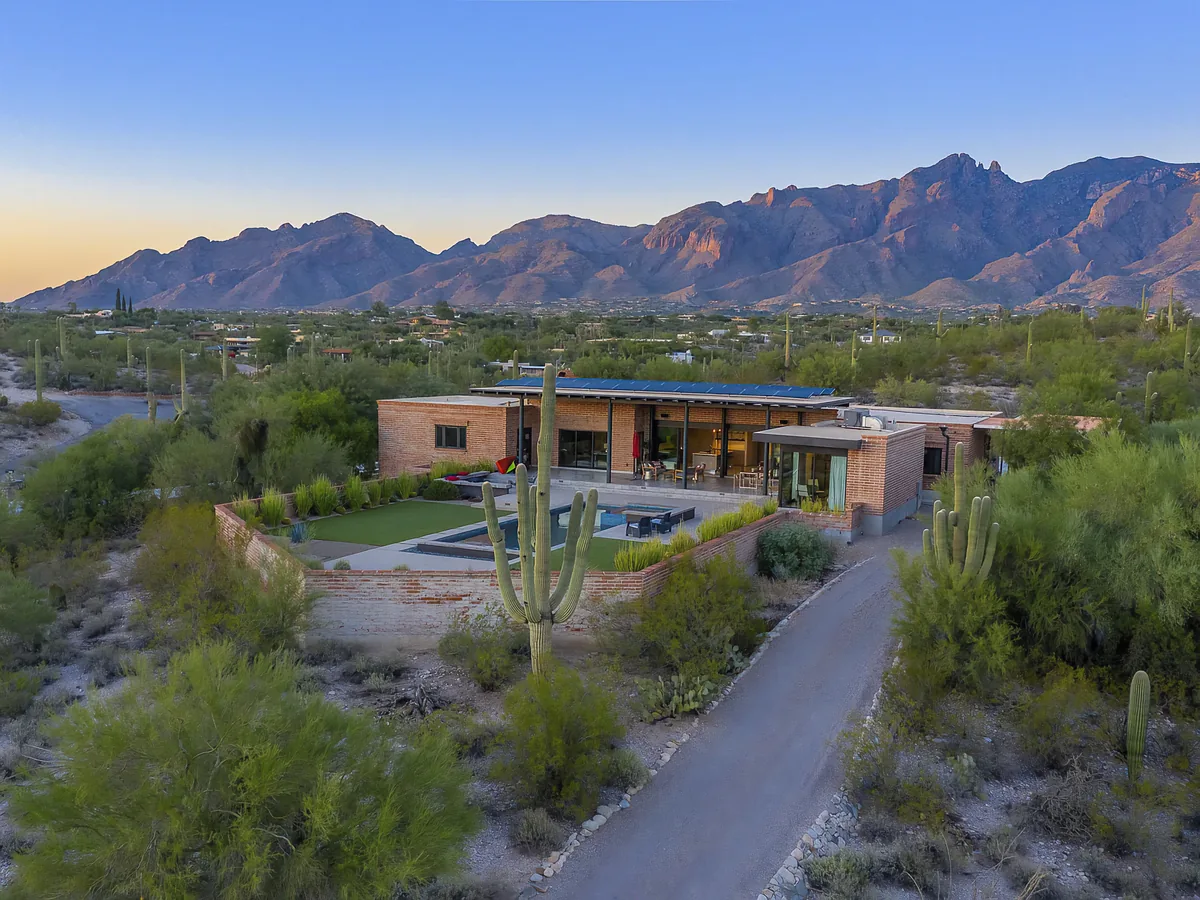 The Camino Antonio home seen from the desert approach, with the Santa Catalina mountains beyond